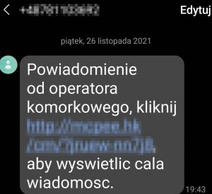 Zdjęcie wiadomości tekstowej z telefonu komórkowego, z fałszywym linkiem do złośliwej aplikacji kradnącej pieniądze z konta bankowego.