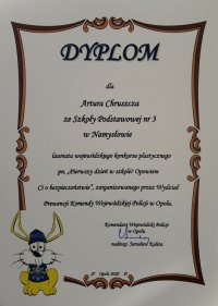 Dyplom dla ucznia za udział w policyjnym konkursie plastycznym.
